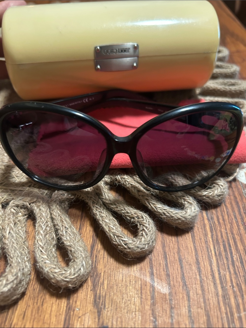 Jimmy Choo Black Frame Sunglasses with arms in silver and black snake skin look